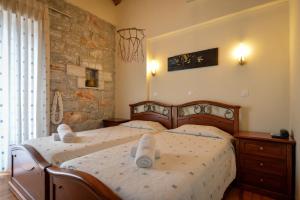 Ένα ή περισσότερα κρεβάτια σε δωμάτιο στο Taletos Apartments  +123 φωτογραφίες