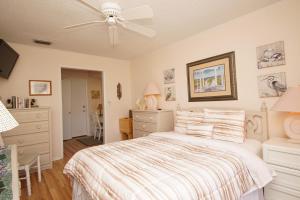 Postel nebo postele na pokoji v ubytování Sandpiper Cove Unit1064 + 29 fotografií