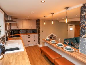 Η κουζίνα ή μικρή κουζίνα στο Seascape Cottage +19 φωτογραφίες