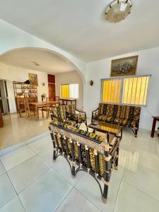 Posezení v ubytování Guesthouse Cocotiers Cotonou