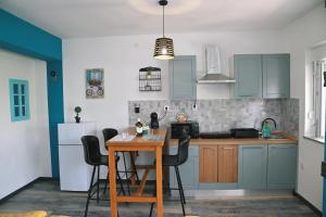 Kuchyň nebo kuchyňský kout v ubytování Apartments Biondi