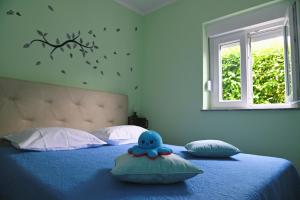 Postel nebo postele na pokoji v ubytování Apartments Biondi
