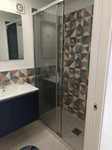 a bathroom with a shower and a sink at Historic House in Ercolano +12 photos