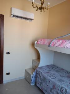 Ένα ή περισσότερα κρεβάτια σε δωμάτιο στο Casa Adelaide