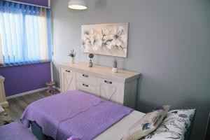 Postel nebo postele na pokoji v ubytování Apartments Biondi