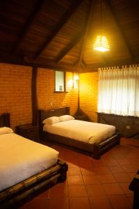 Cama o camas de una habitación en Arrayan y Piedra
