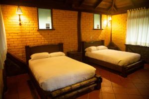 Cama o camas de una habitación en Arrayan y Piedra