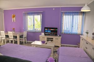Postel nebo postele na pokoji v ubytování Apartments Biondi