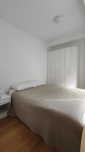 Ένα ή περισσότερα κρεβάτια σε δωμάτιο στο Apartment Pržno