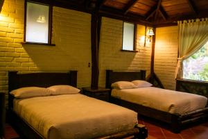 Cama o camas de una habitación en Arrayan y Piedra