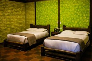 Cama o camas de una habitación en Arrayan y Piedra