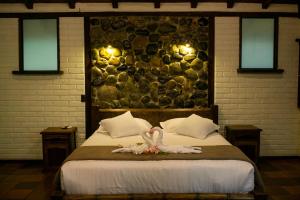 Cama o camas de una habitación en Arrayan y Piedra