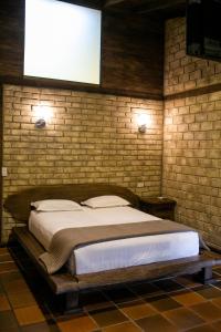 Cama o camas de una habitación en Arrayan y Piedra