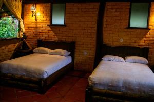 Cama o camas de una habitación en Arrayan y Piedra