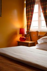Postel nebo postele na pokoji v ubytování Werners Boutique Hotel