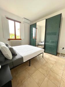 Postel nebo postele na pokoji v ubytování Appartamento Aurora Empoli - Firenze