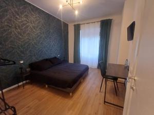 Postel nebo postele na pokoji v ubytování B&B camere fiori 8
