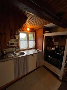 Kuchyň nebo kuchyňský kout v ubytování Ferienhaus Pliescherhof