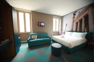 Una televisión o centro de entretenimiento en Vacanze Romane Vaticano