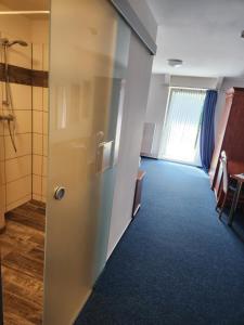 Koupelna v ubytování Hotel Hoyers in Pinneberg