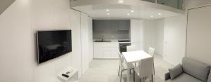 A kitchen or kitchenette at Duomo Inn
