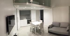 A kitchen or kitchenette at Duomo Inn