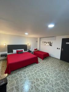 Postel nebo postele na pokoji v ubytování Hotel Ofix