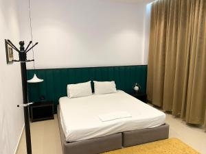 Postel nebo postele na pokoji v ubytování Guesthouse Niko