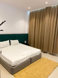Postel nebo postele na pokoji v ubytování Guesthouse Niko