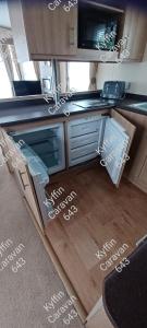 Η κουζίνα ή μικρή κουζίνα στο Kyffin 643 +9 φωτογραφίες