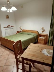 Postel nebo postele na pokoji v ubytování B&B Bourg