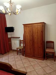 TV a/nebo společenská místnost v ubytování B&B Bourg