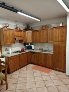 Kuchyň nebo kuchyňský kout v ubytování B&B Bourg