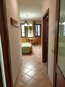 Postel nebo postele na pokoji v ubytování B&B Bourg