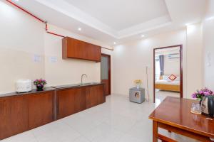 Kuchyň nebo kuchyňský kout v ubytování Biển Vàng Vũng Tàu Hotel