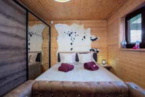 Postel nebo postele na pokoji v ubytování Chalet Senec