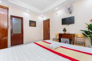 TV a/nebo společenská místnost v ubytování Biển Vàng Vũng Tàu Hotel