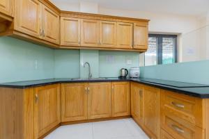 Kuchyň nebo kuchyňský kout v ubytování Biển Vàng Vũng Tàu Hotel