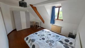 a bedroom with a bed and a window at House to visit Paris close to Paris, CdG Airport and Villepinte in Aulnay-sous-Bois