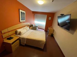 Sjónvarps- og/eða afþreyingartæki á HOTEL Javier Prado Inn