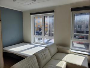 Ένα ή περισσότερα κρεβάτια σε δωμάτιο στο Kengo apartments Raatuse