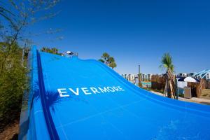 a blue water slide with the word everyone on it at Evermore Orlando Resort in Orlando
