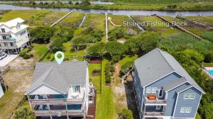 an aerial view of a home with ariel fishing dock at Beyond the Sea in Thomas Landing