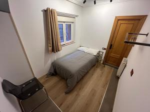 A bed or beds in a room at Lotila Flats Rio Caudal