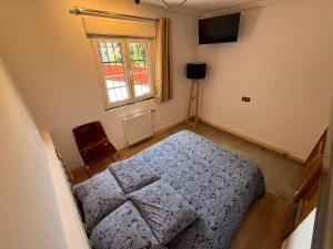 A bed or beds in a room at Lotila Flats Rio Caudal