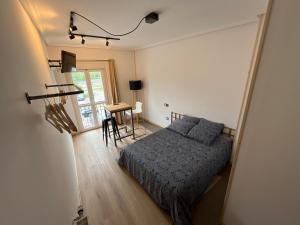 A bed or beds in a room at Lotila Flats Rio Caudal