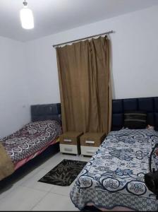 Postel nebo postele na pokoji v ubytování Challet in Amwaj-EGY NorthCoast ,Al Alamein City-Sidi Abdelrahman
