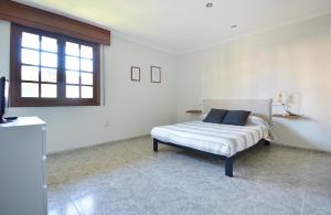 Postel nebo postele na pokoji v ubytování Apartamento próximo a la Playa de As Sinas