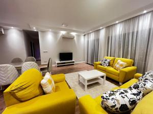 Χώρος καθιστικού στο شقة فندقية داخل بيفرلي هيلز الشيخ زايد رقم هاتف صفر صفر اتنين صفر واحد واحد صفر اتنين اربعه ثلاثه صفر 222