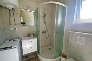 Koupelna v ubytování Apartmani Portina